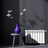 Радиатор секционный Le Heat Bimetal 350/90 8 секций боковое подключение биметалл белый